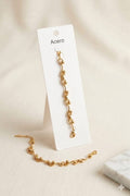 Pulsera Ondas con Bolitas Dorada - Acero Inoxidable