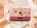 Cartera Sweet Candy Rosa Madiana exterior llaves candados camafeos vintage