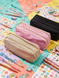 Estuche doble compartimento en colores negro, rosa y beige con cremallera dorada