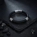 Pulsera Cuero Trenzado Negro con Detalles Acero Inoxidable