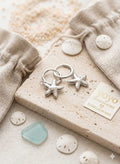 Pendientes Aro Huggie Estrella de Mar Plateado - Acero Inoxidable | YOYO