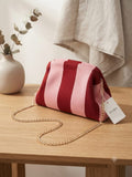 Bolso clutch rayas granate y rosa con cadena dorada