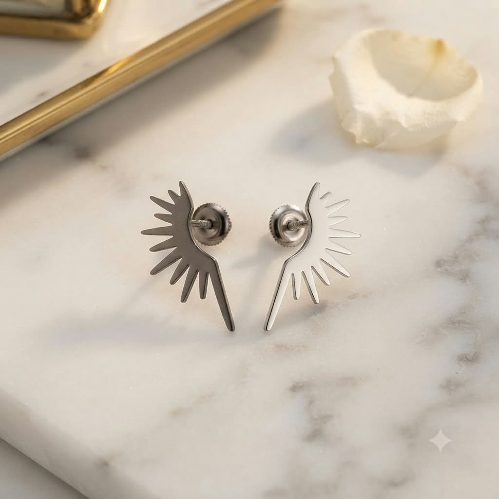 Pendientes studs sol con rayos asimétricos de acero inoxidable